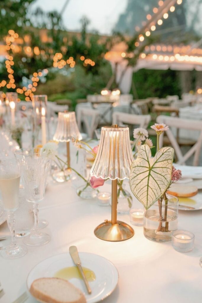 Wedding reception table with lamps