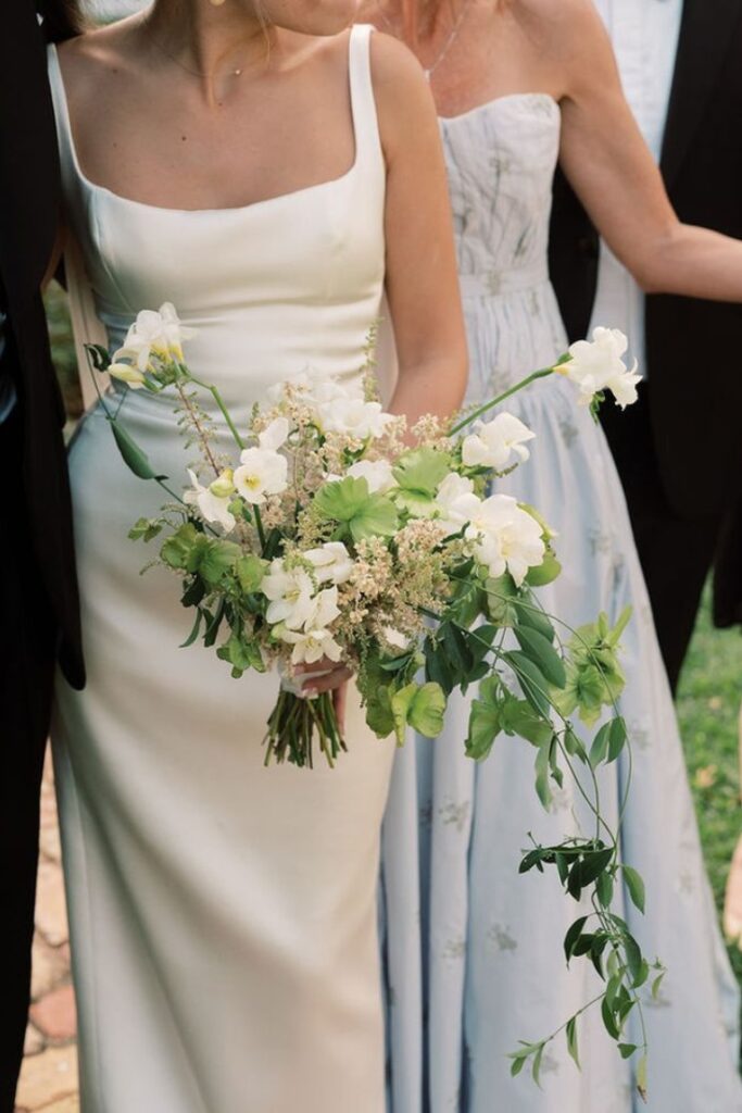 A bridal bouquet with greenery trailing down